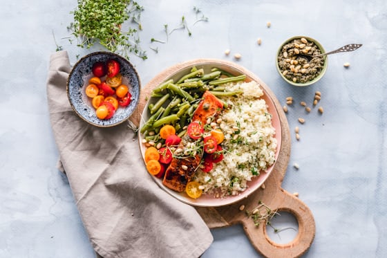 Protein bowl with grains, greens and grilled chicken